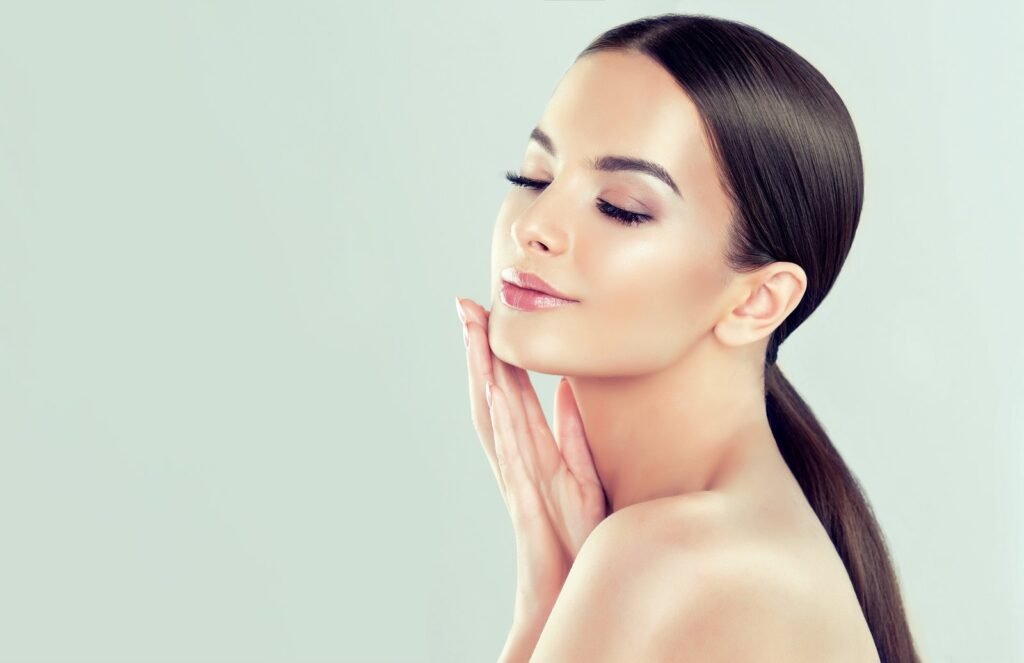 Portrait of young woman with clean fresh skin and soft delicate make up - SW1 Clinic