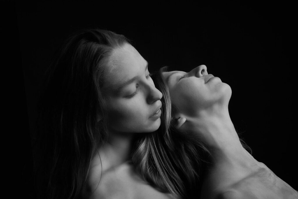 grayscale photo of woman with blonde hair